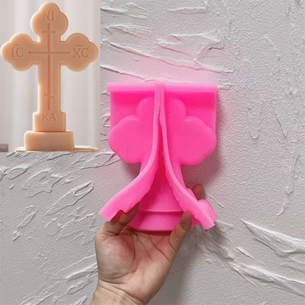 Pink Round Ends + Base cross silicone mold beside a peach casting