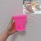 Pink silicone mold for rounded gingerbread holiday bell design