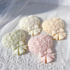 Four flat rose bouquets with curled petals and bow tails