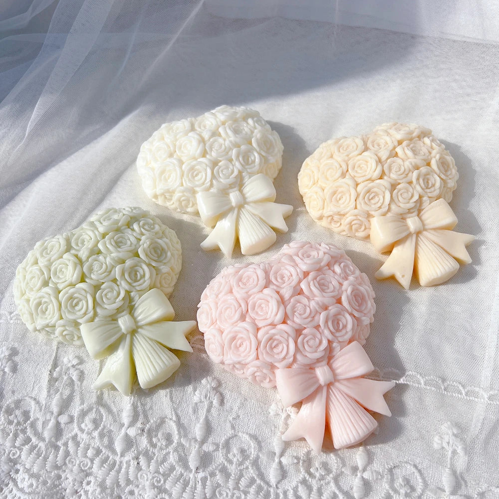 Four flat rose bouquets with curled petals and bow tails