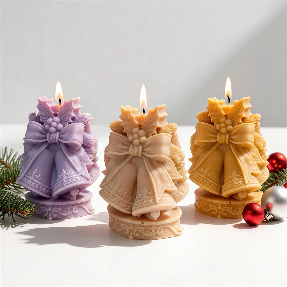 Lilac cream and yellow paired-bell candles with holly details