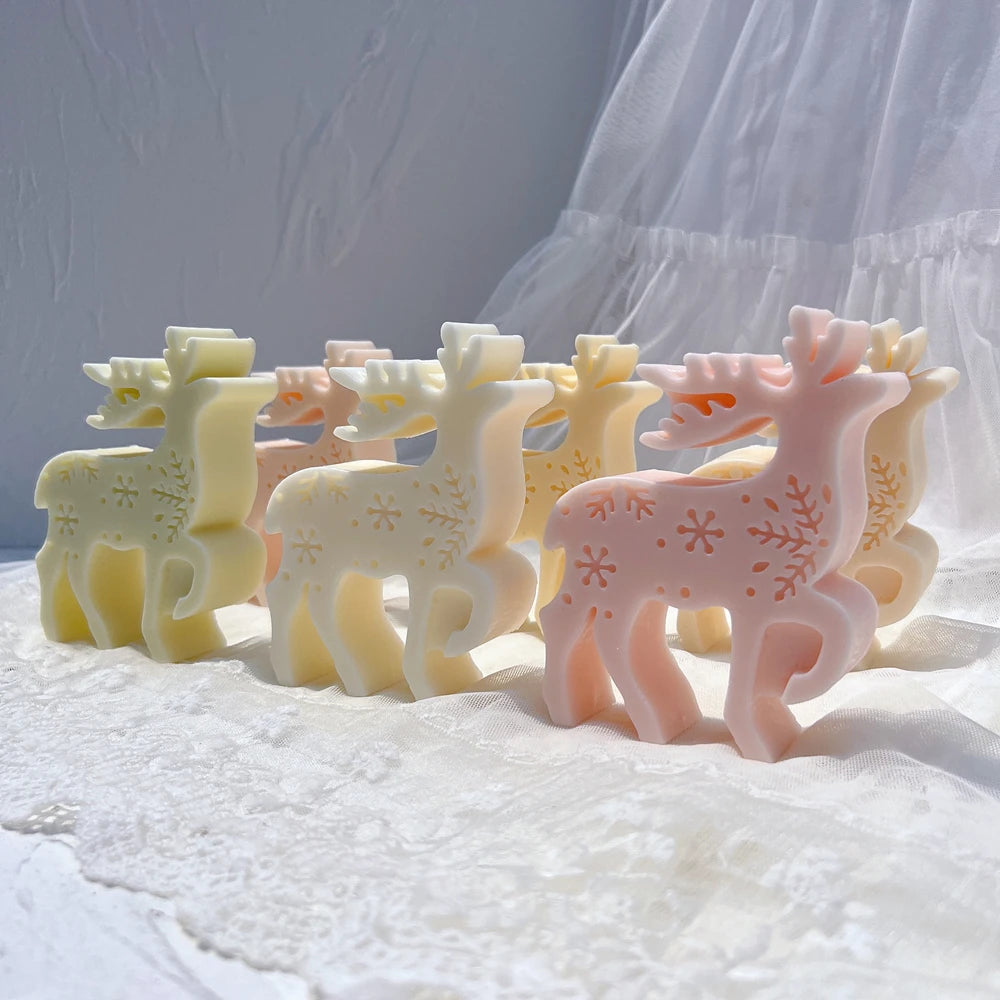 Group of reindeer figures showing antler size and flank decoration
