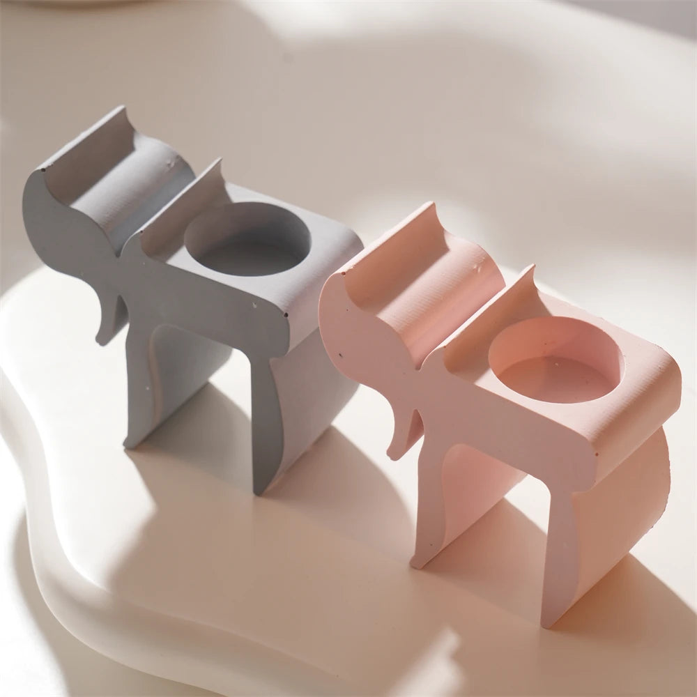 Top closeup of candle recesses in two Chai tealight holder castings