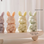 Rabbit candle figures with upright ears and carrot detail