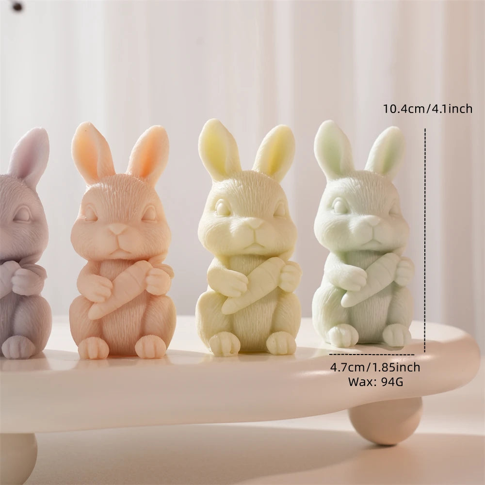 Rabbit candle figures with upright ears and carrot detail