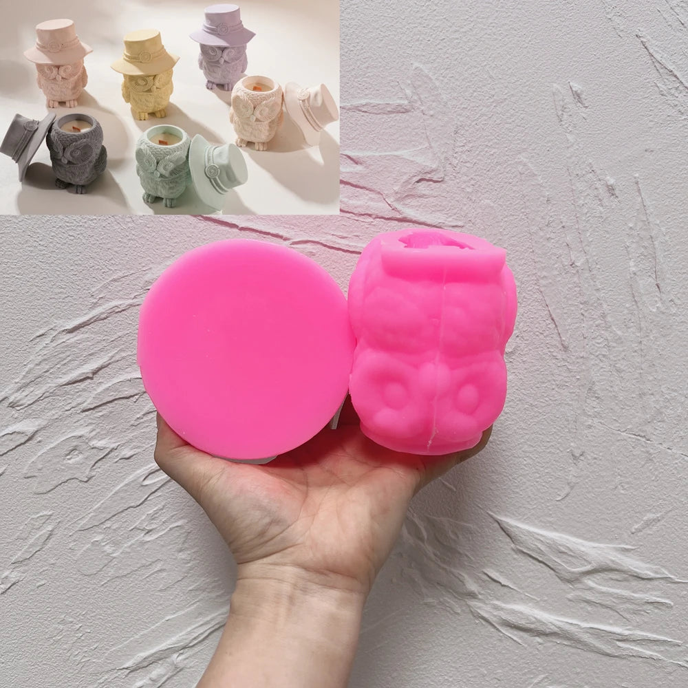 Pink silicone owl-body and top-hat lid mold components