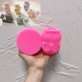 Pink silicone owl-body and top-hat lid mold components
