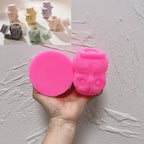 Pink silicone owl-body and top-hat lid mold components
