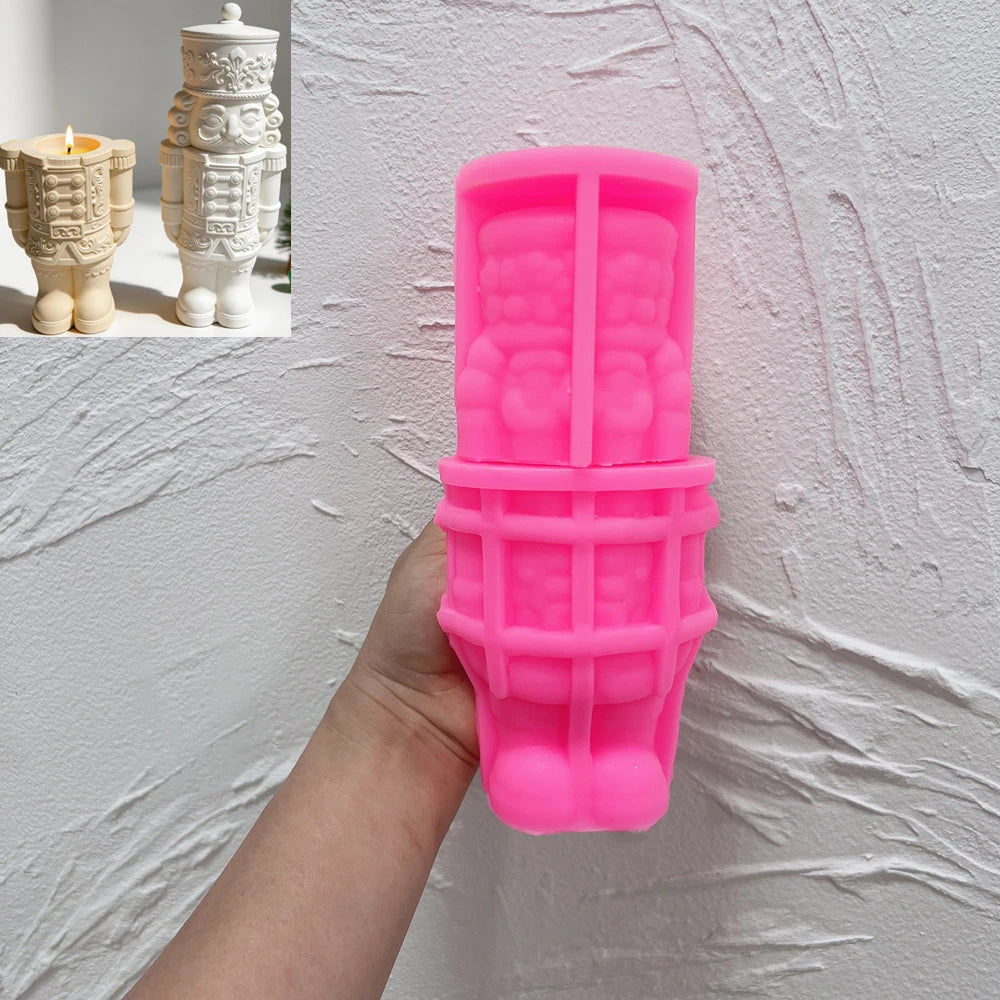 Pink silicone nutcracker soldier mold showing reliefs of face coat and boots