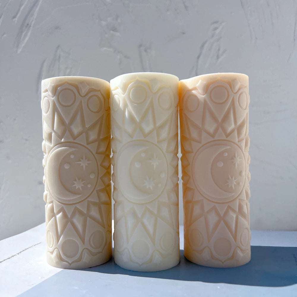 Cream and peach moon mandala pillars with pointed line patterns