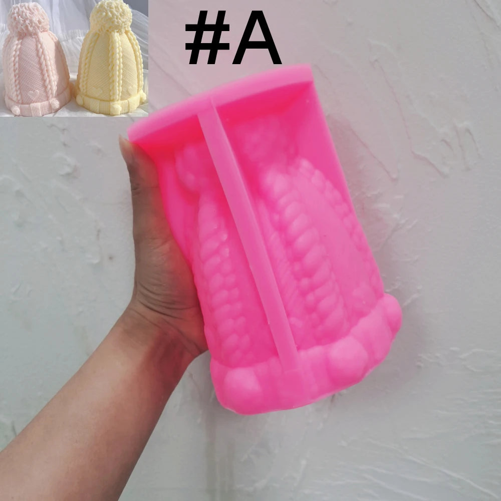 Pink silicone Cable Knit A hat mold showing long braided panels and cuff