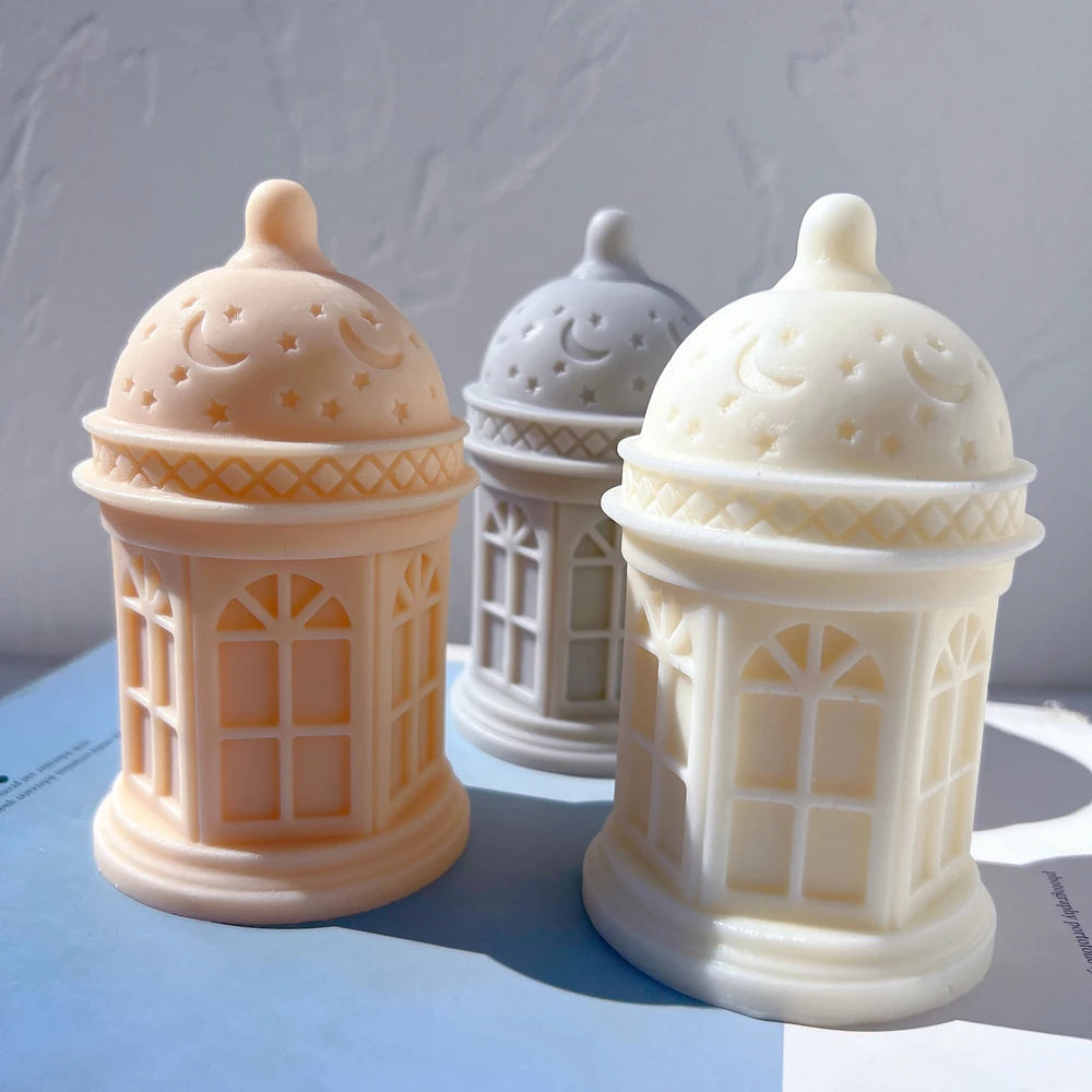 Three lantern-shaped candle examples in an angled arrangement