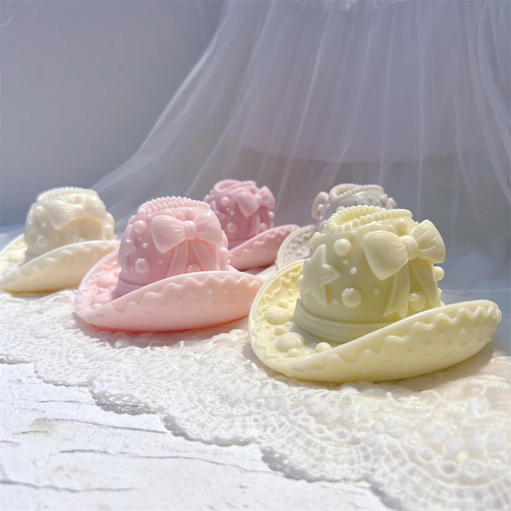 Angled decorated hat castings with icing-like details