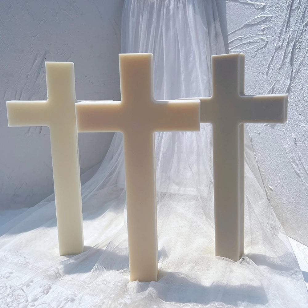 Three cross figures standing side by side