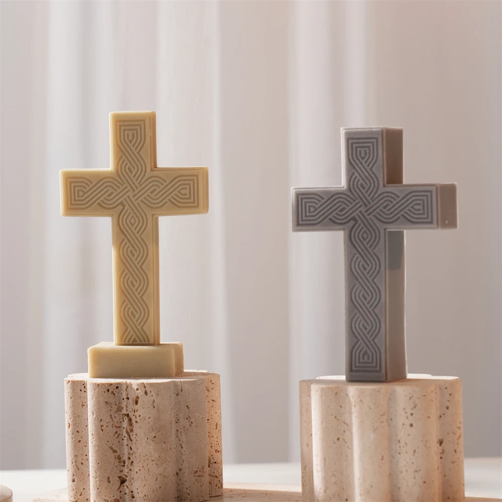 Two straight-edged cross castings with ornamental relief