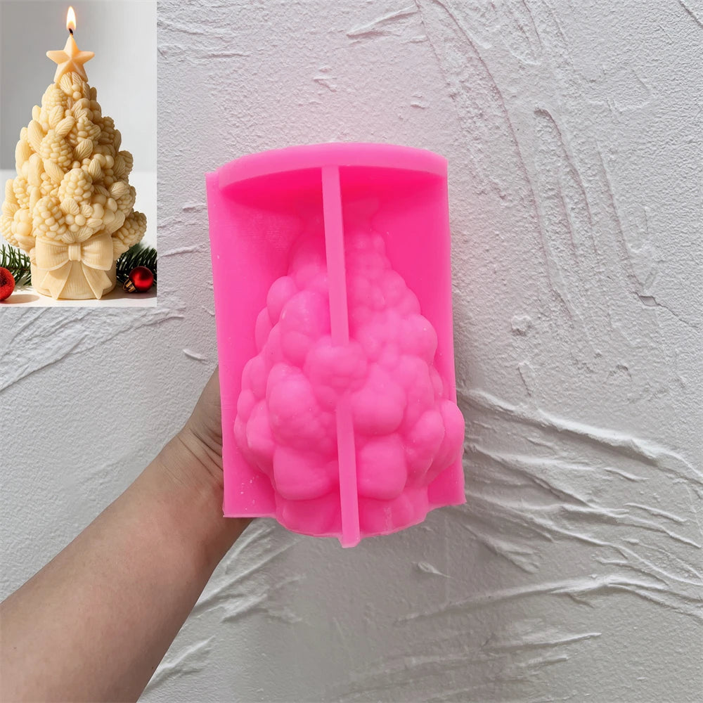 Pink silicone mold for star-topped pinecone tree with bow