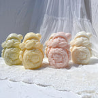 Pastel snowmen with winter hats and affectionate cuddle poses