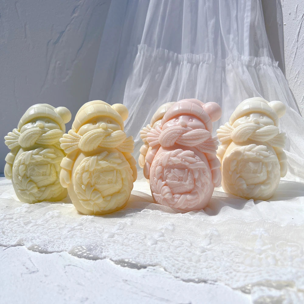 Pastel snowmen with winter hats and affectionate cuddle poses