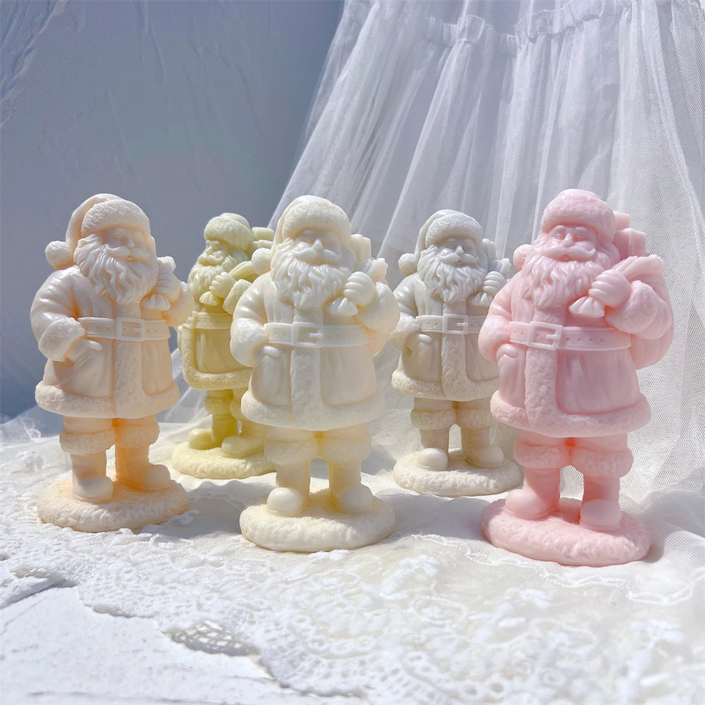 Group of standing Santa castings with beards and gift sacks in cream, gray and pink