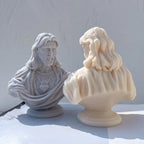 Jesus bust castings showing rear robe folds and hair