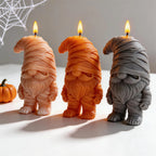 Mummy gnome candles showing bent hats and layered bandage texture
