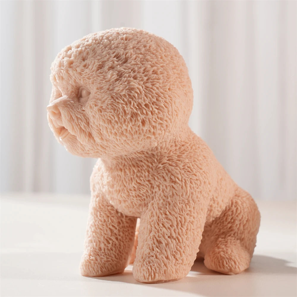 Side view of a fluffy puppy casting showing its round head and sitting pose
