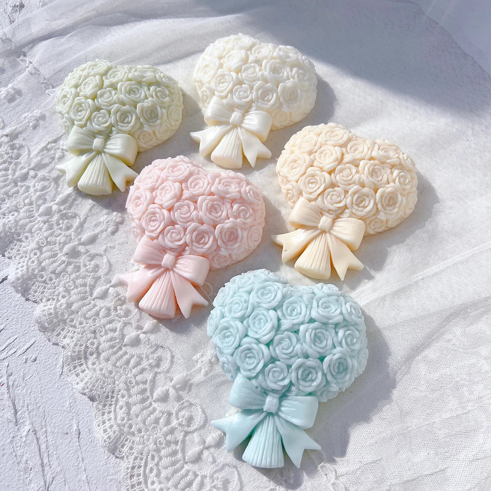 Pastel rose bouquet reliefs with ribbon bows