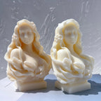 Two front-facing female busts on stepped pedestals