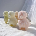 Side and rear views of woolly lamb figures