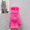 Pink fluffy sitting dog silicone mold held in one hand