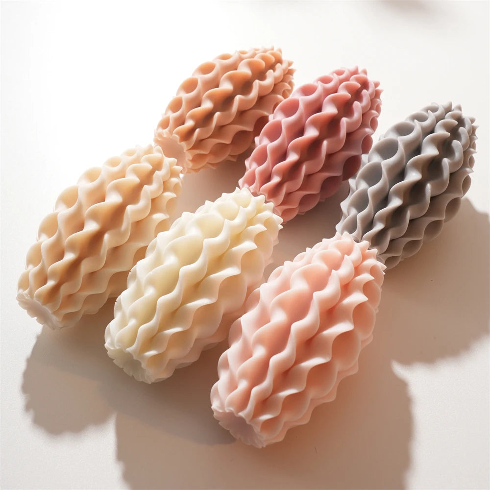 Several wavy-ridge castings arranged in a group