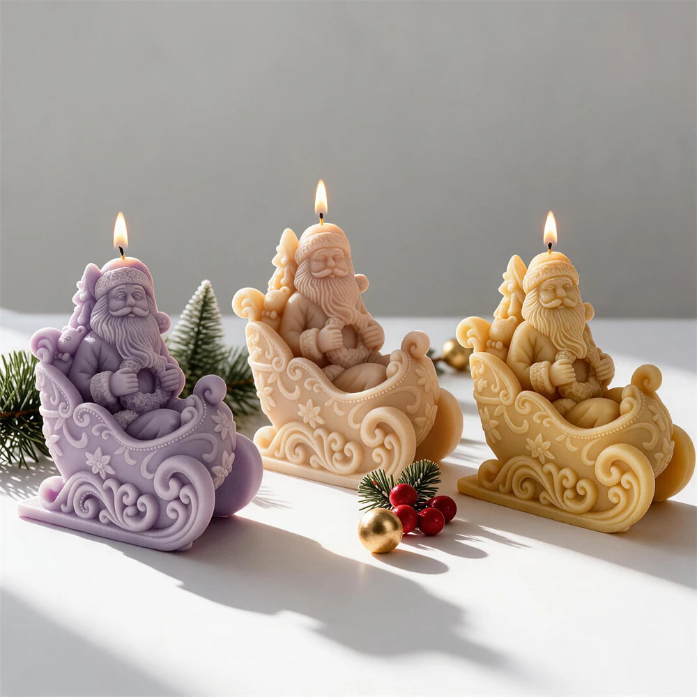 Purple cream and yellow Santa-in-sleigh candles with scrollwork sides