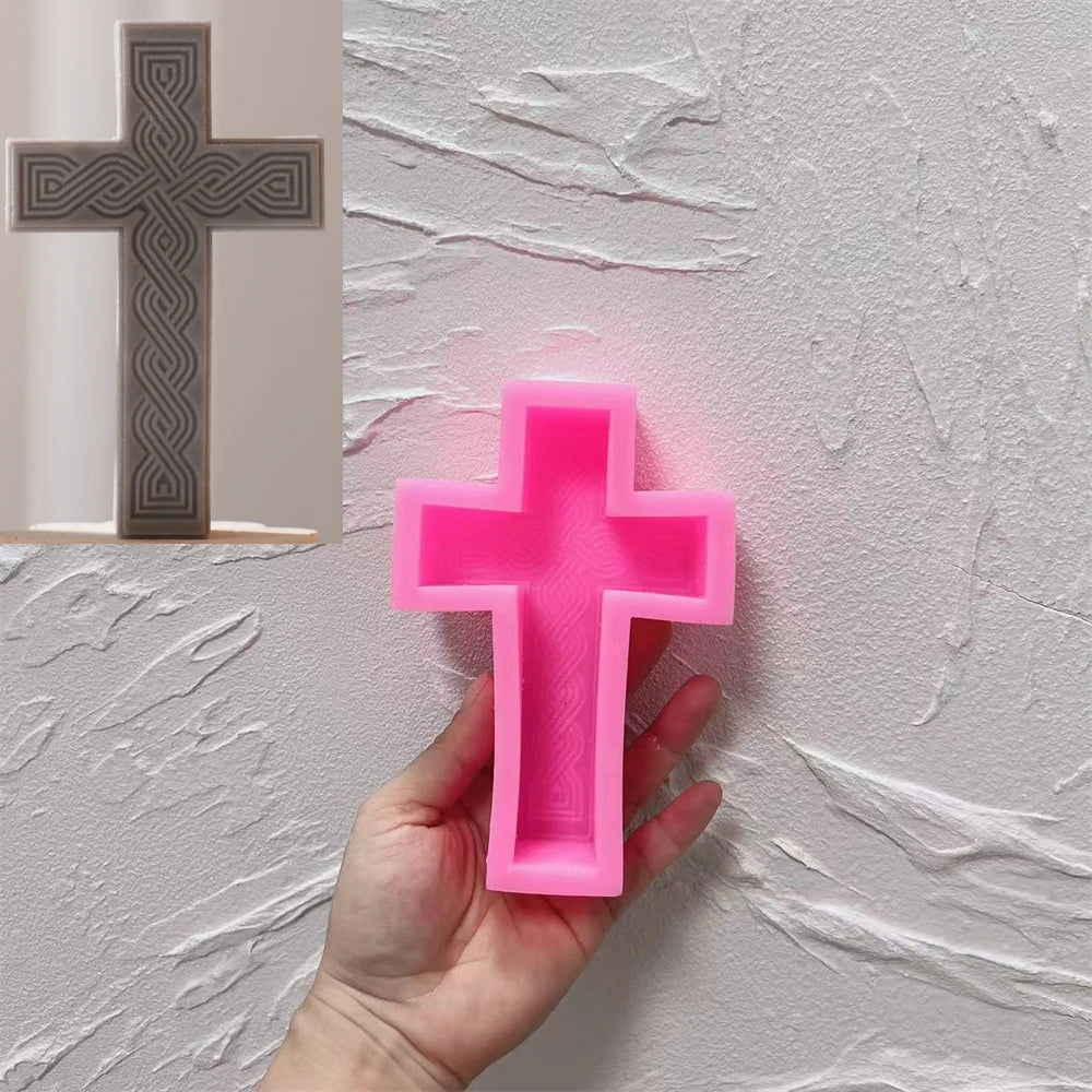 Pink Straight Cross silicone mold beside a charcoal casting