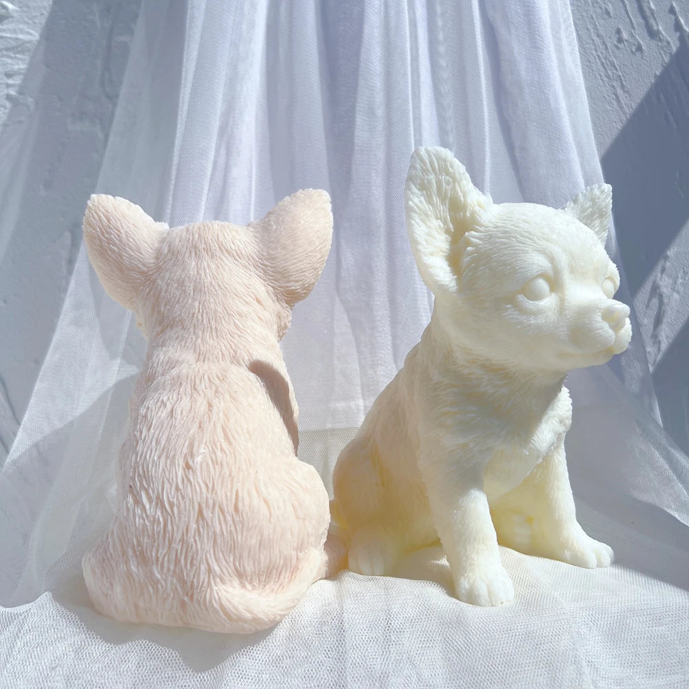 Rear and front views of seated puppy castings showing fur texture
