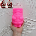 Pink silicone mold with detailed front Santa figure cavity