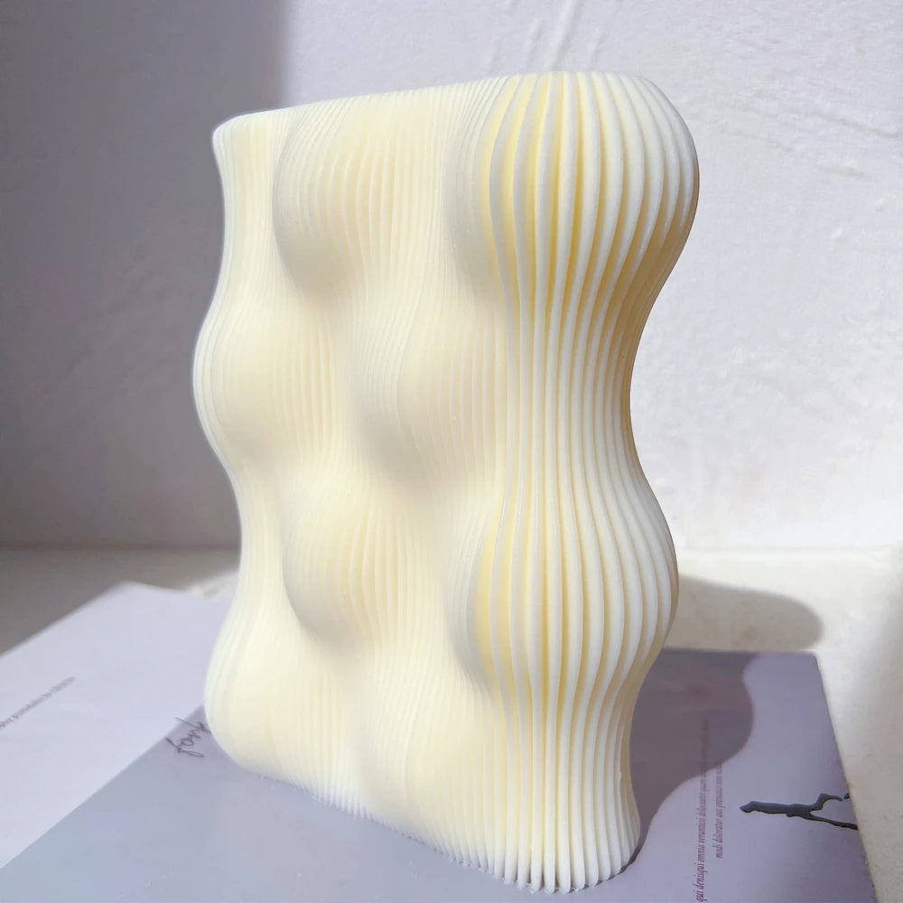 Single ribbed bubble wave candle block