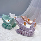 Angled view of hollow sleigh vessels and curved rims