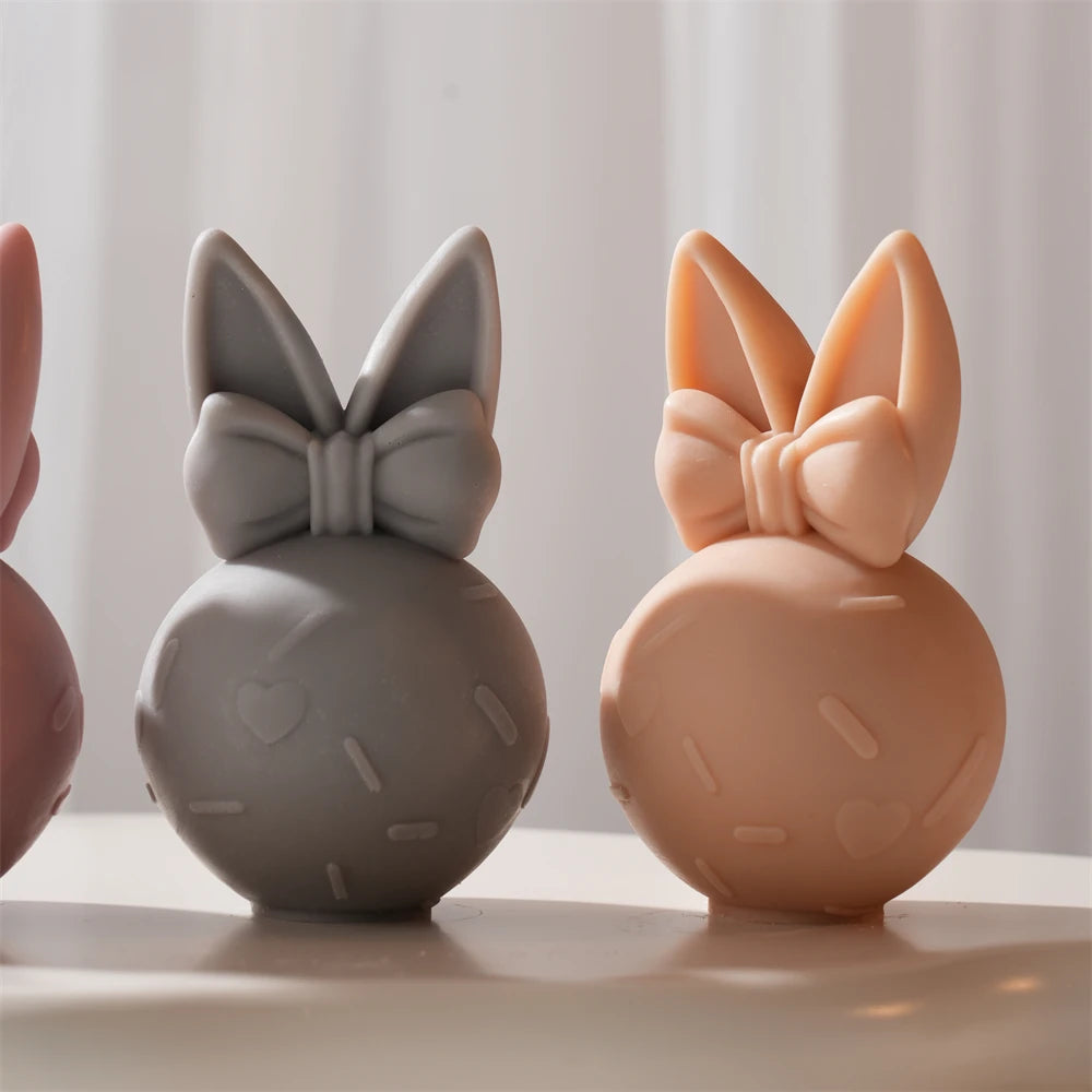 Front views of rounded bunny eggs with small dash marks