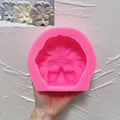 Pink silicone mold for feathered theatrical mask decorative casting
