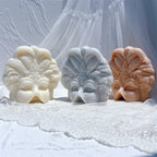 Decorative feathered masquerade mask relief castings in neutral wax colors