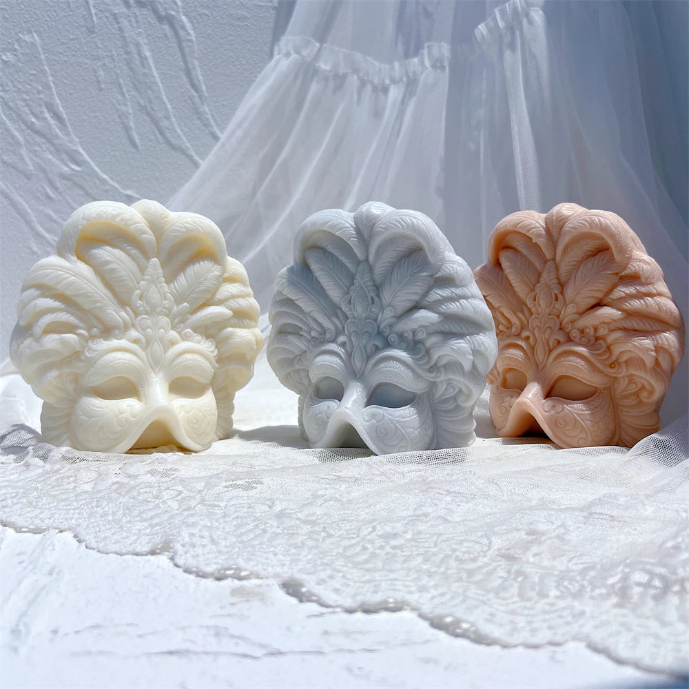 Decorative feathered masquerade mask relief castings in neutral wax colors