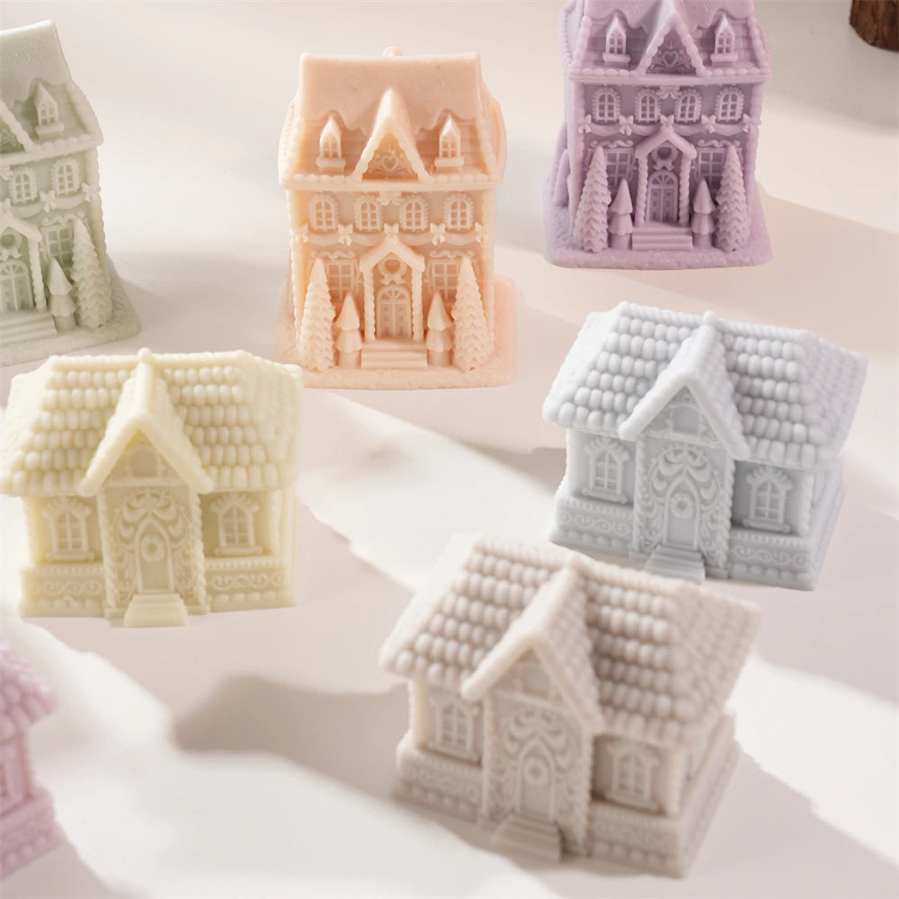 Close view of pastel gingerbread cottages with steep pitched roofs