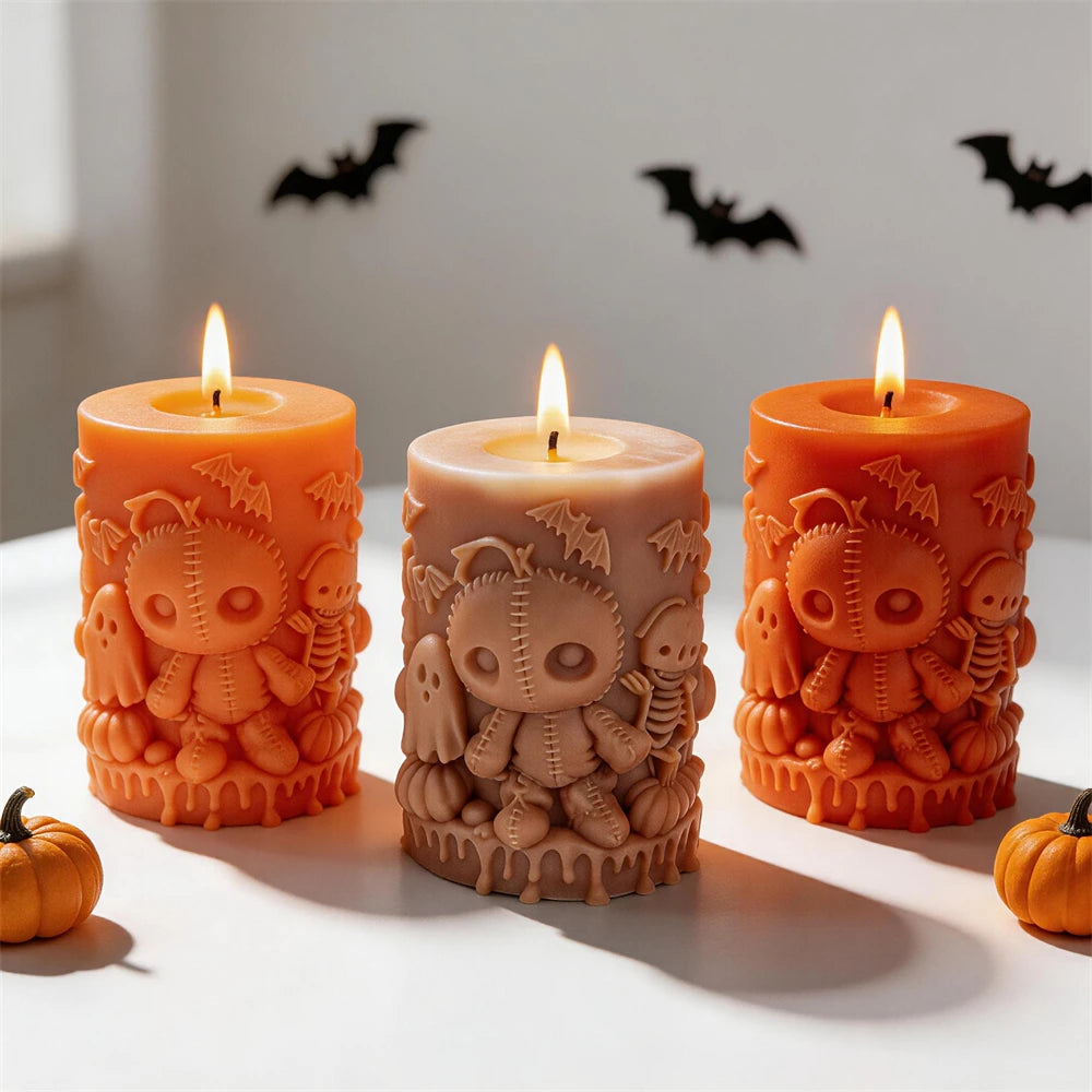 Close view of stitched dolls and ghosts on three pillar candles