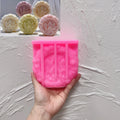 Pink silicone winter village medallion mold