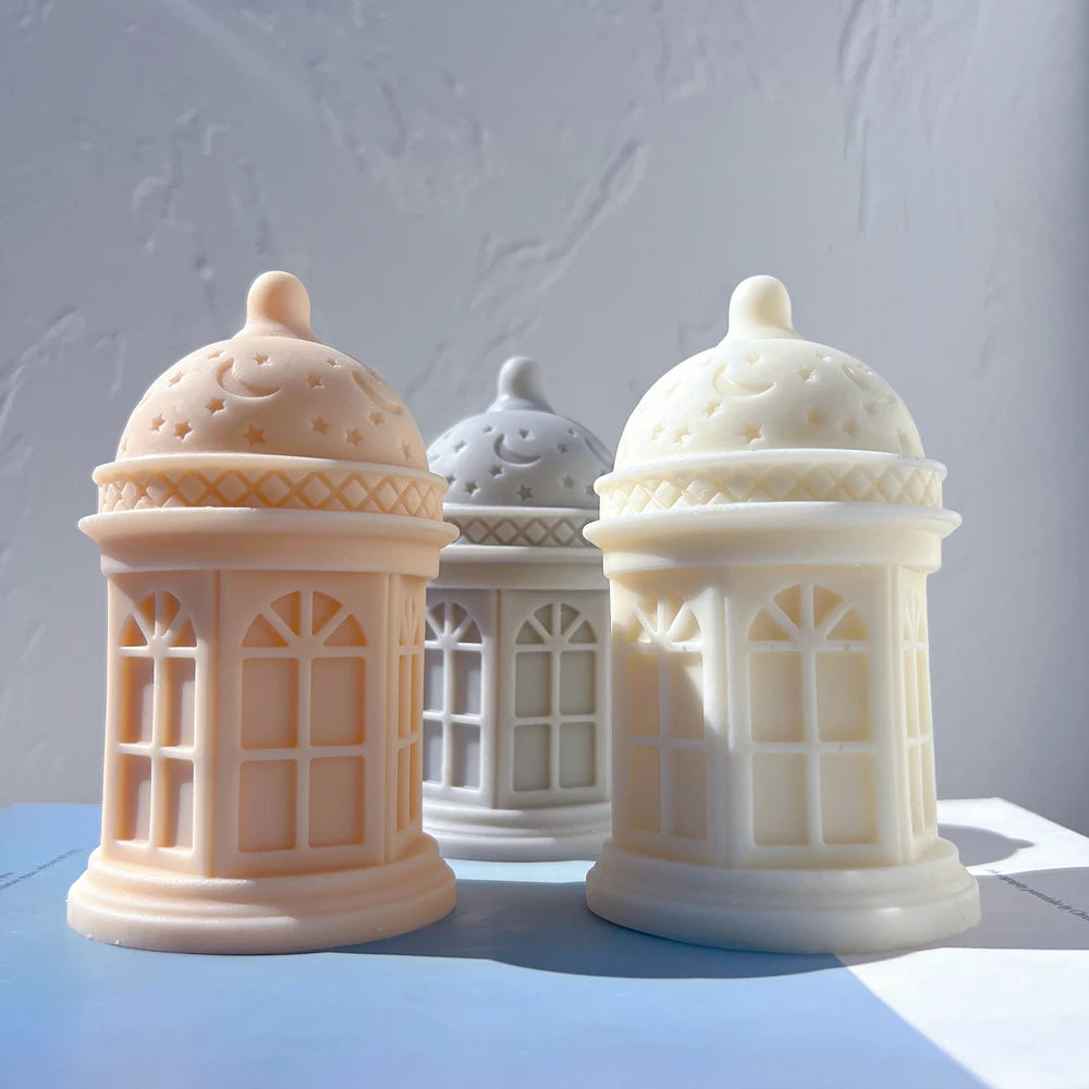 Peach and cream lantern castings with arched window relief