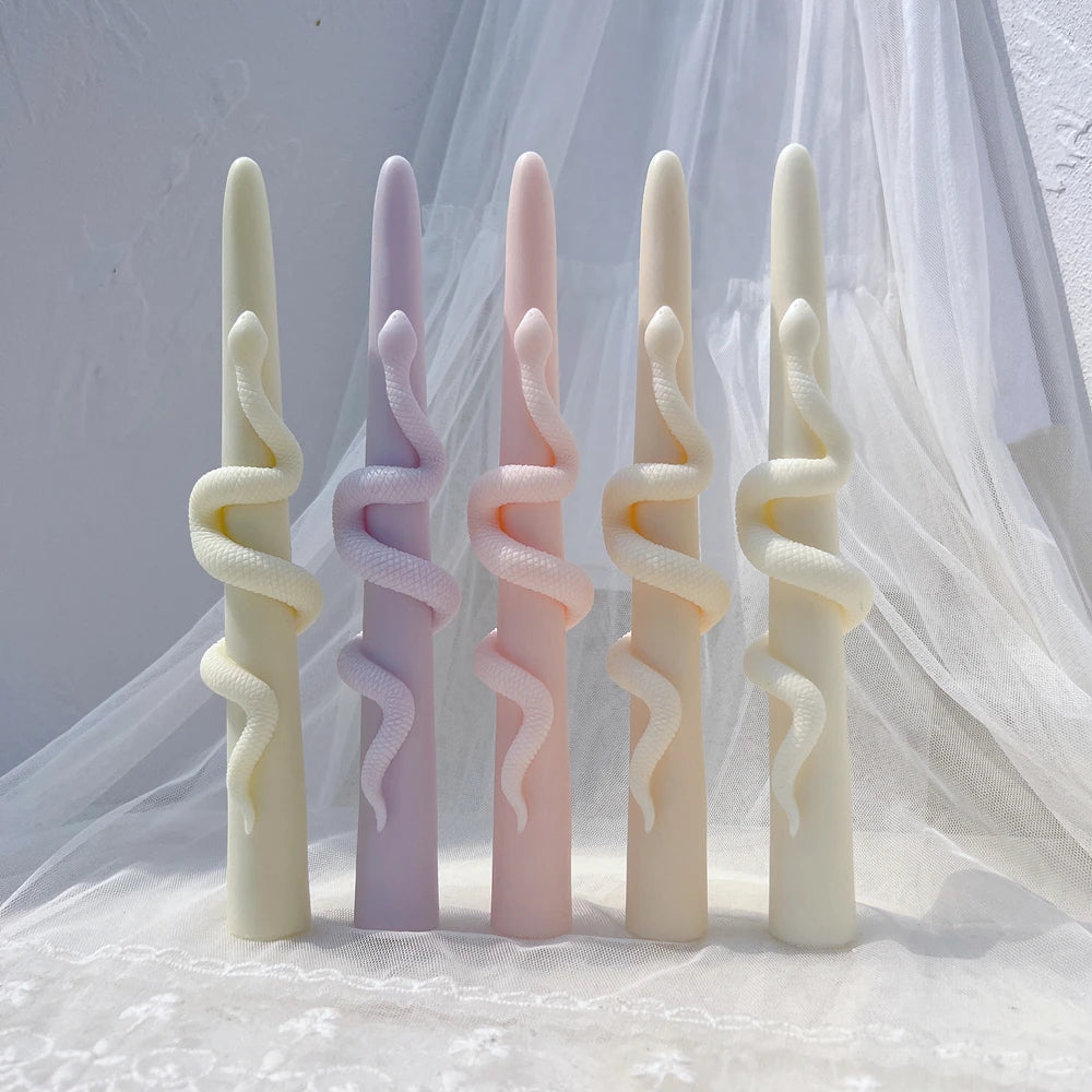Snake-wrapped taper examples with visible smooth central columns