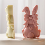 Side profile beside the decorated back-view bunny