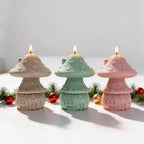 Two sculptural toadstool candles highlighting their ringed tiers