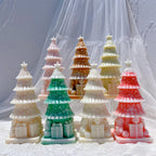 Tree candle examples with tiered branches and wrapped presents
