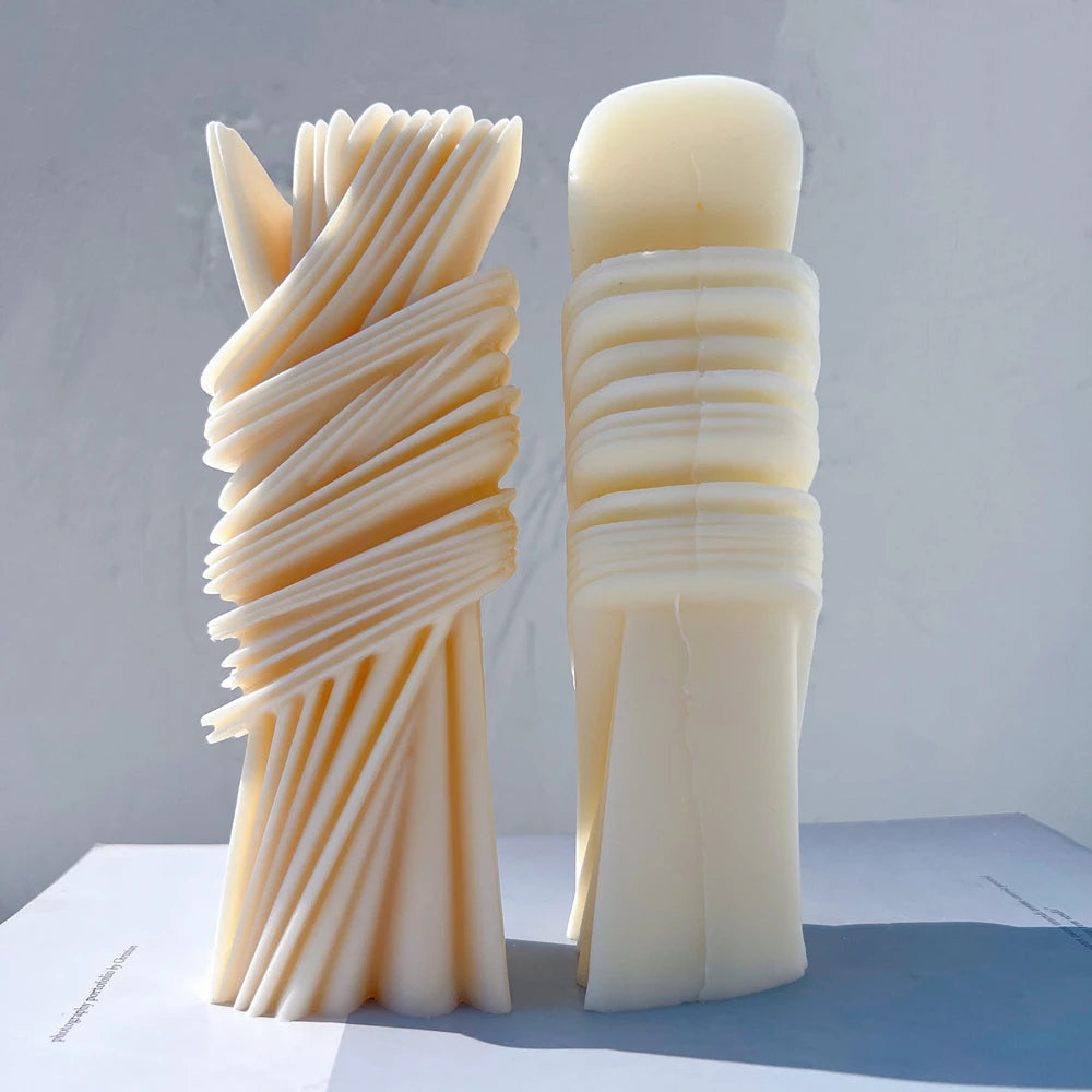 Front and rear views of a wrapped ribbon pillar showing contrasting surfaces